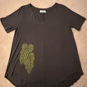 Zenana Outfitters Brown Top w/contrast green monstera leaf design.
